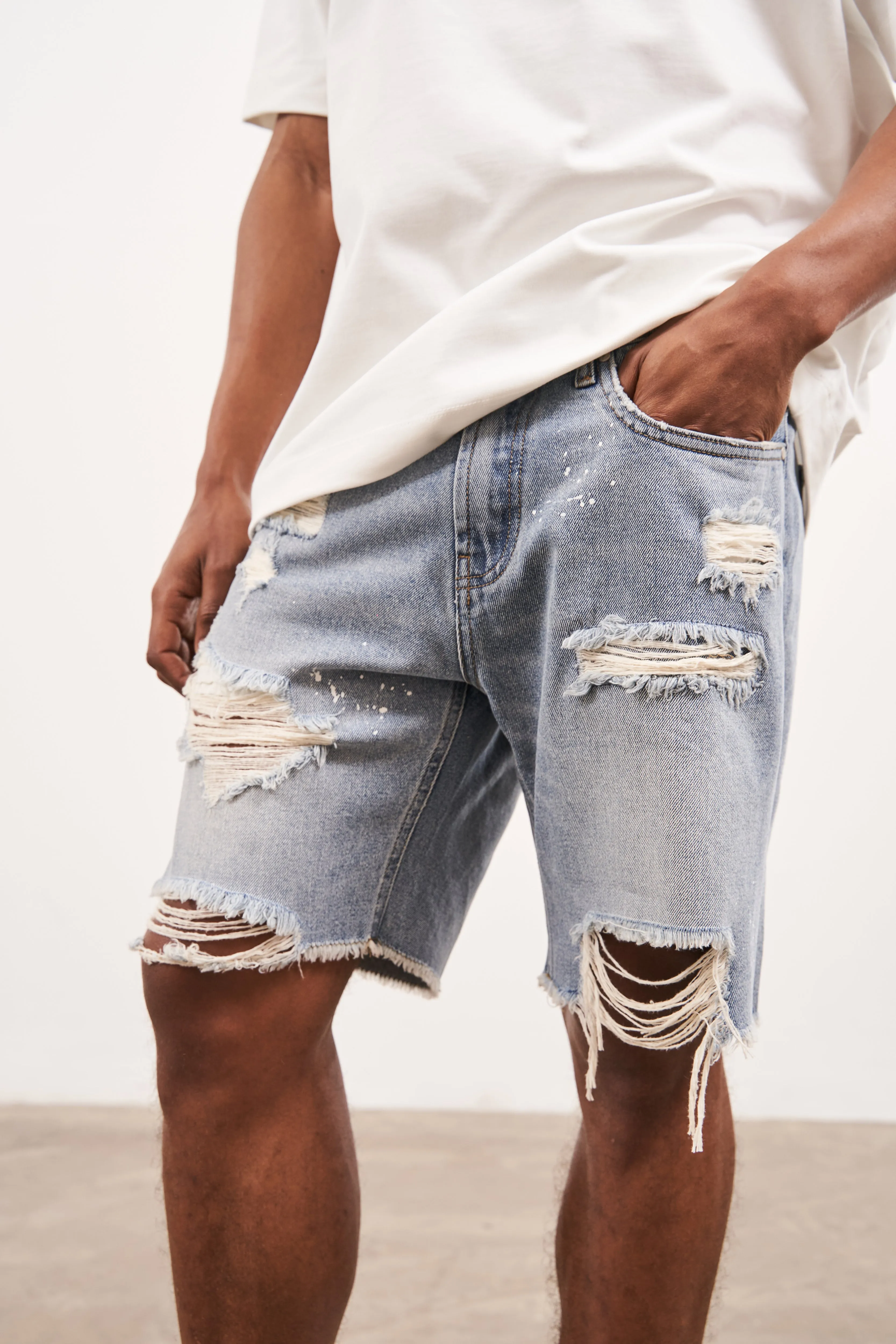 DISTRESSED RAW HEM DENIM SHORTS - WASHED BLUE