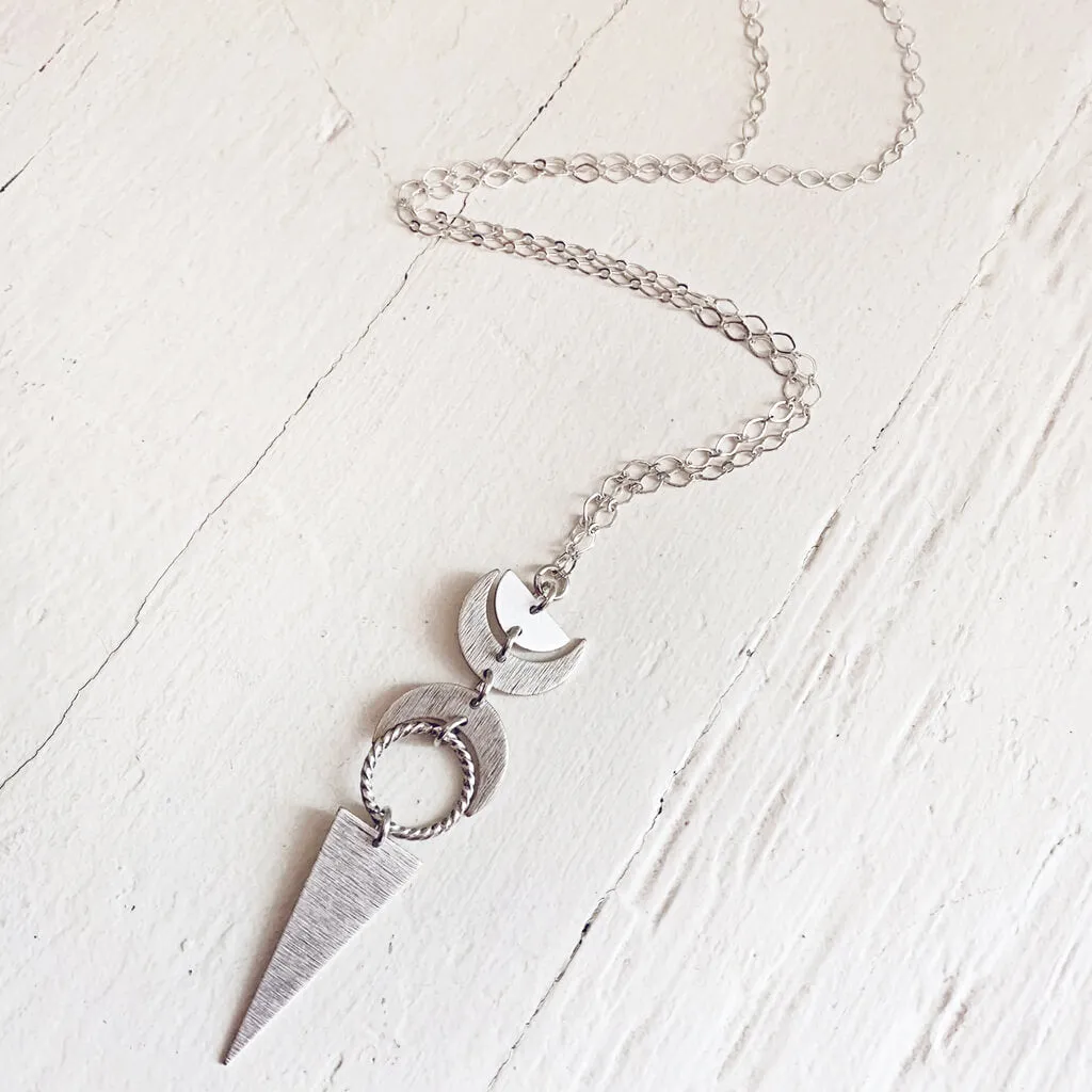 moon phases // half moon, waxing, waning crescent moons, new moon and long triangle pendant necklace