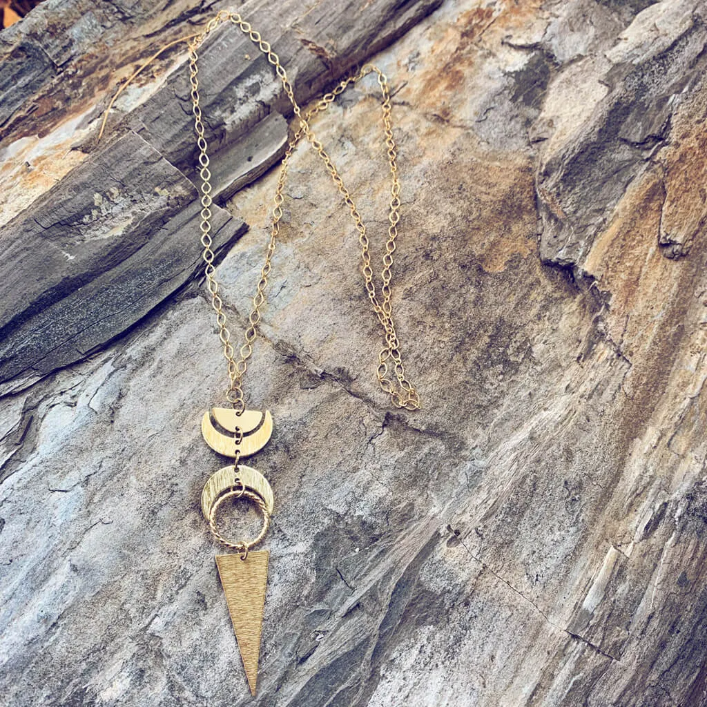 moon phases // half moon, waxing, waning crescent moons, new moon and long triangle pendant necklace