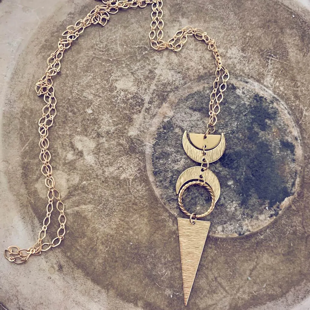 moon phases // half moon, waxing, waning crescent moons, new moon and long triangle pendant necklace