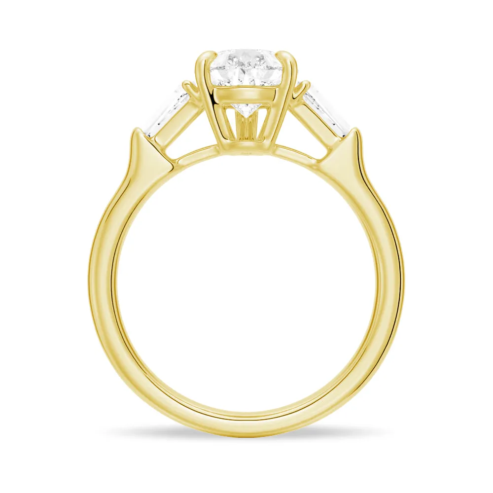 Pear Cut Engagement Ring with Tapered Baguette Stones