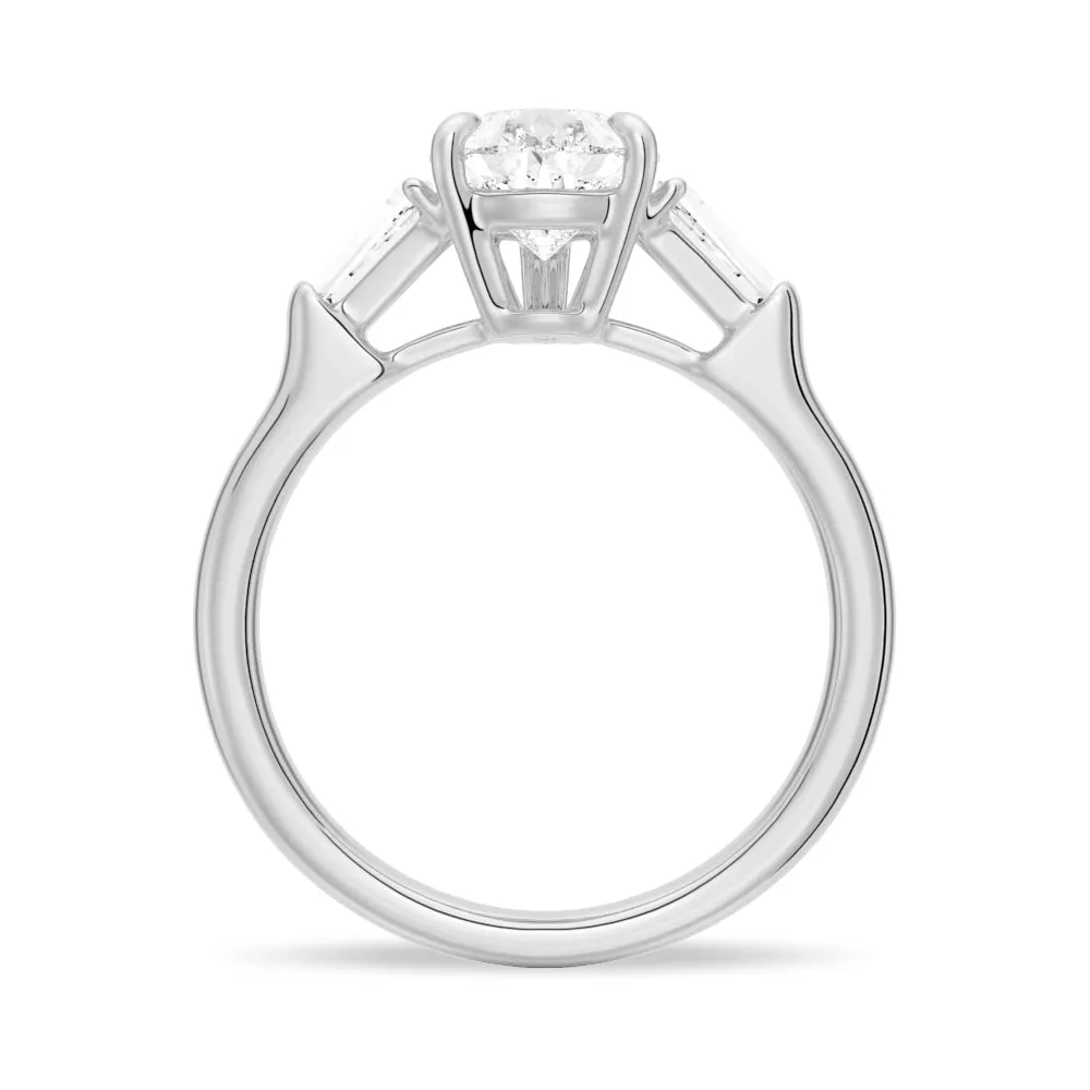 Pear Cut Engagement Ring with Tapered Baguette Stones