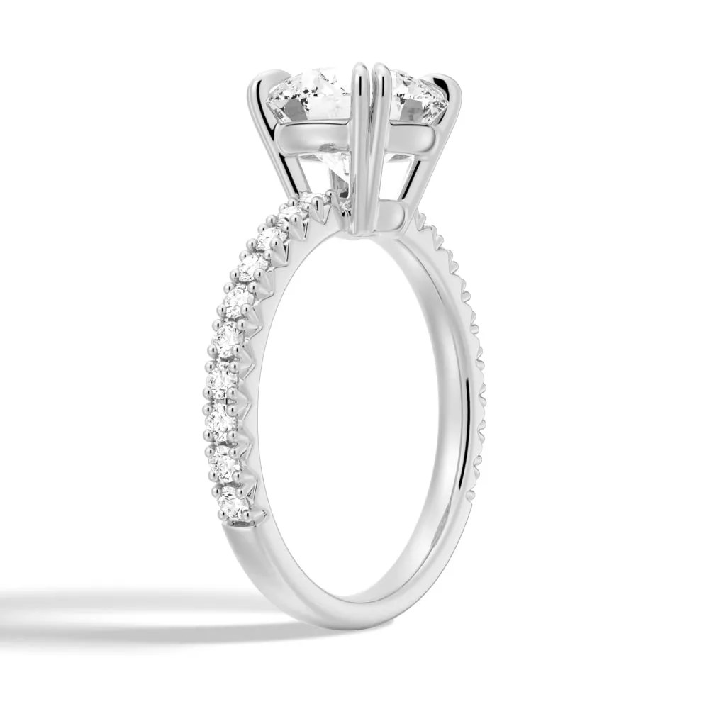 Solitaire Round Cut Engagement Ring With Pavé Accents