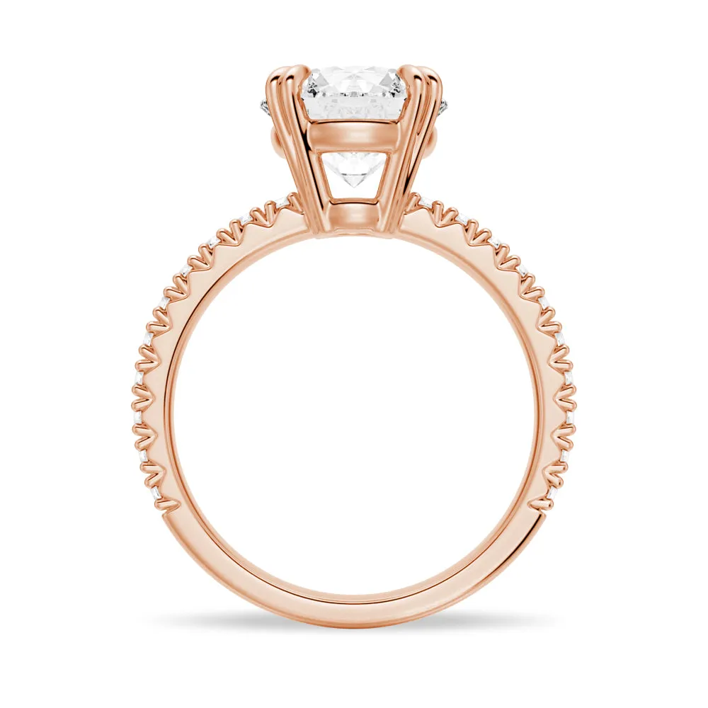 Solitaire Round Cut Engagement Ring With Pavé Accents